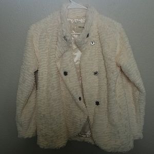 A small fur coat or jacket